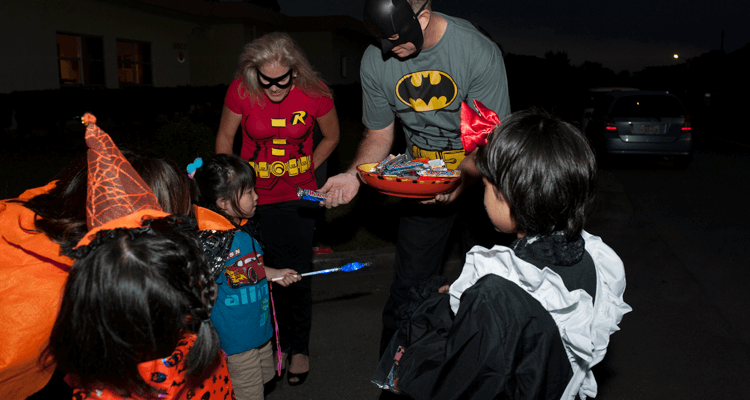 trick-or-treaters getting candy