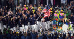 Olympic team holding US flag