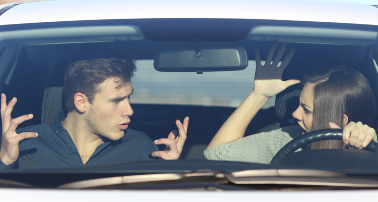 Couple arguing in car
