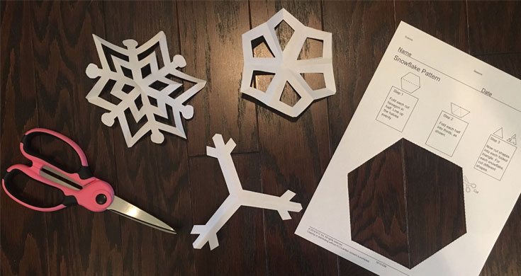 paper snowflakes with scissors