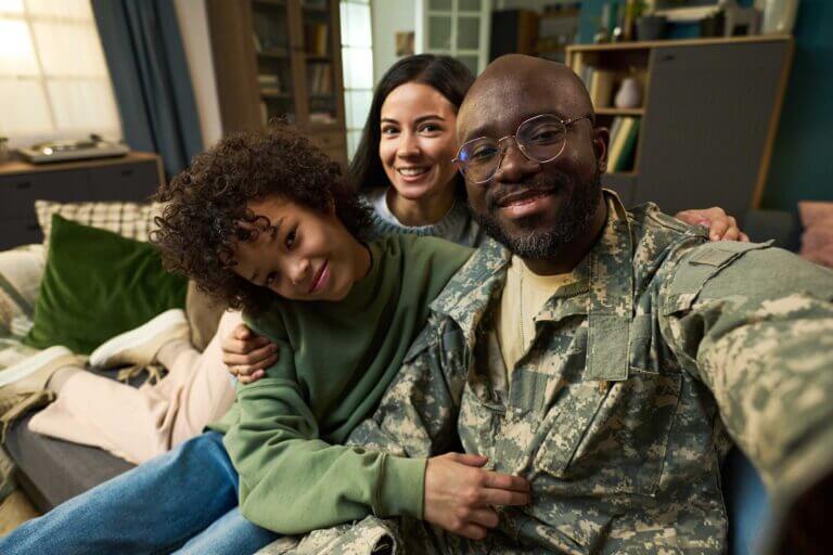 Soldire with 2 students