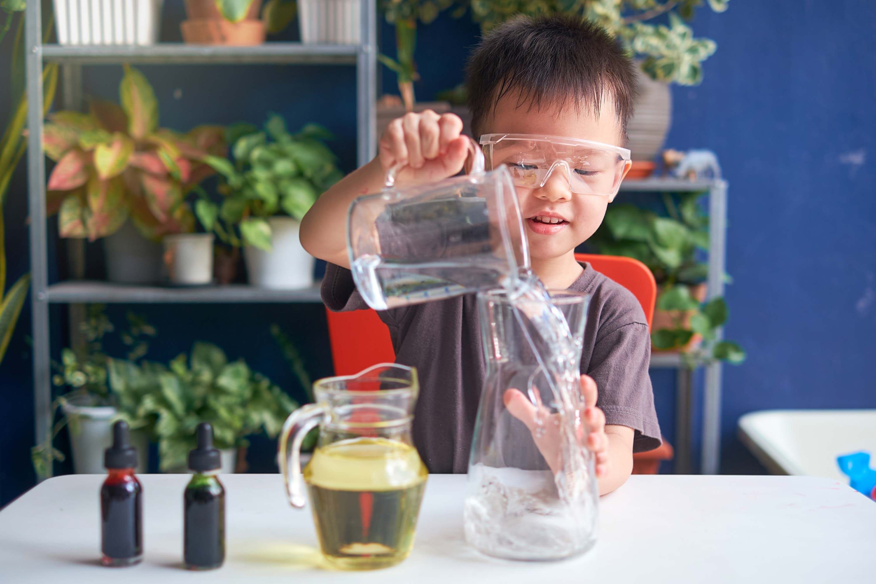 Elementary student doing a science experiment