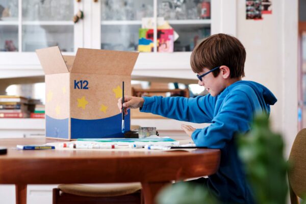 Student working with his school supplies